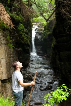 Hiker Enjoying the Moment in the Wild Nature on a Rainy Day