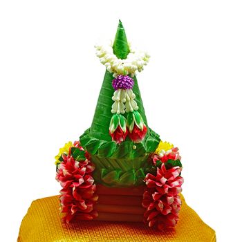 Flower decorated on tray with pedestal to be used in the ceremony to get ordained as a Buddhist monkhood