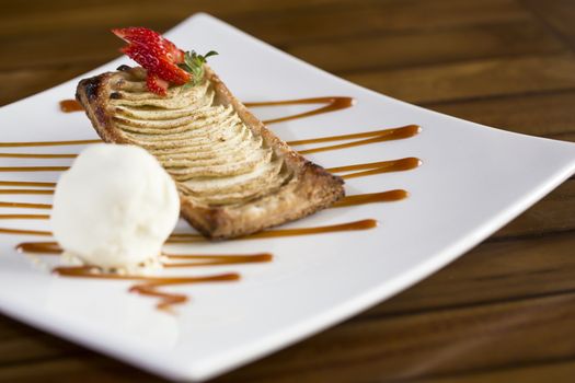 Strawberry biscuit dessert with icecream ready to be served. 