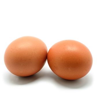 Brown chicken egg isolated on a white background 