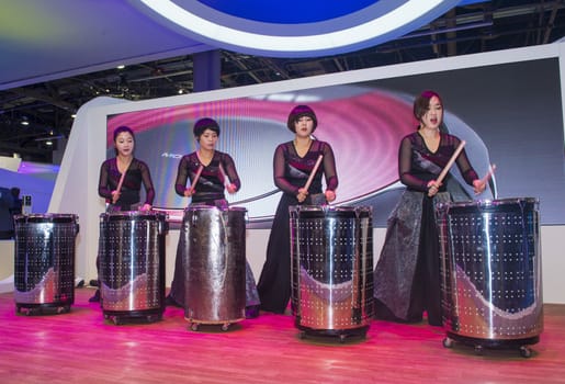 LAS VEGAS - JANUARY 10 : Group of drummers at the CES show held in Las Vegas on January 10 2014 , CES is the world's leading consumer-electronics show 