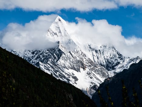 Dramatic weather at Chanadorje mountain in Yading nature reserve in Sichuan (China)