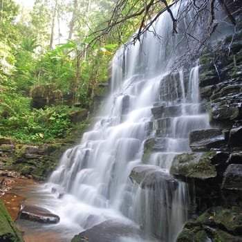 Waterfall in Thai National Park, Man Dang Waterfall, Phuhinrongkla National Park, Petchaboon Province, Thailand, in summer season