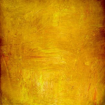 Gold color paint on grunge background 