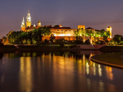 Wawel castle and Vistula river at night (Krakow, Poland)