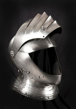 Iron helmet of the medieval knight. Very heavy headdress