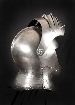 Iron helmet of the medieval knight. Very heavy headdress