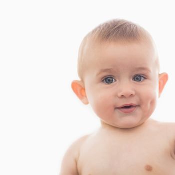 Portrait of innocent baby bay smiling at home