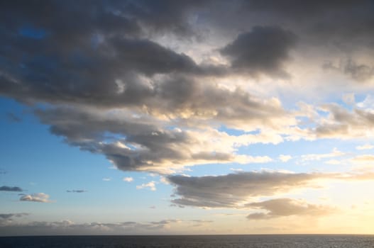 Cloudscape, Colored Clouds at Sunset near the Ocean