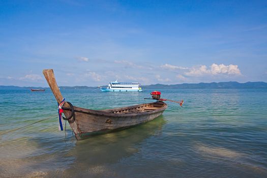 Boat in  sea is moving over  waves, Thailand. Beautiful tropical landscape.