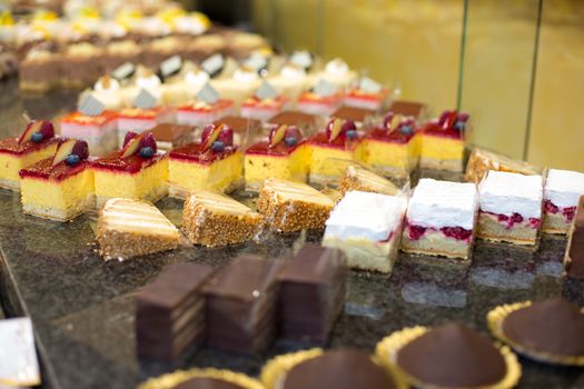 Cake displayed in shop window of confectionery or cafe