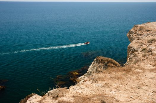 Motor boat in the sea near Tarhankut, Crimea, Black Sea, Ukraine