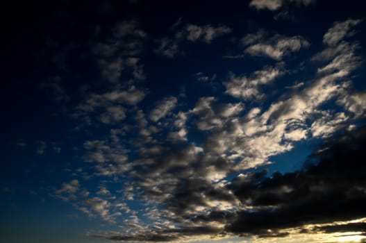 Cloudscape, Colored Clouds at Sunset near the Ocean