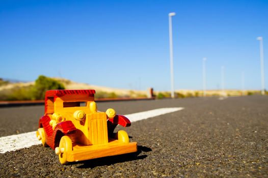 Transportatio Concept Toy Car on The Asphalt Street