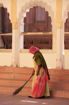 Indian woman sweeping floor, Mehrangarh Fort, Jodhpur, Rajasthan, India