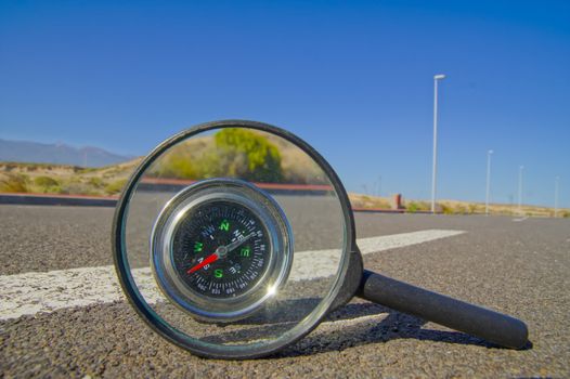 Travel Concept Compass on the Asphlat Road