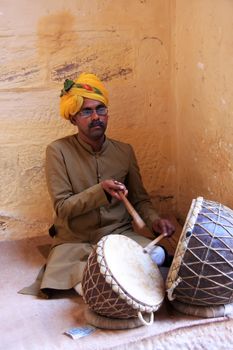 Indian man playing drums, Mehrangarh Fort, Jodhpur, Rajasthan, India