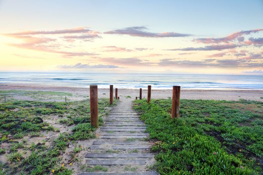  Pretty sunrise and narrow path leading down to a glorious beach, The Entrance NSW Australia