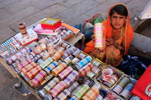 Indian woman selling bangels at Sadar Market, Jodhpur, Rajasthan, India