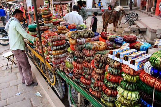 Indian man selling bangels at Sadar Market, Jodhpur, Rajasthan, India