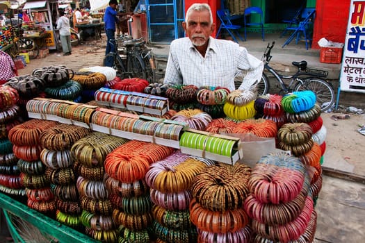 Indian man selling bangels at Sadar Market, Jodhpur, Rajasthan, India