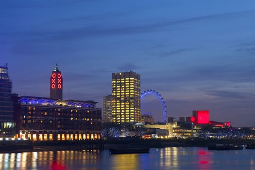 View of the River Thames with the Oxo Tower, London Eye and the Royal Festival Hall.