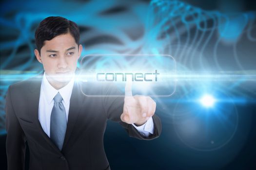 The word connect and unsmiling asian businessman pointing against abstract glowing black background