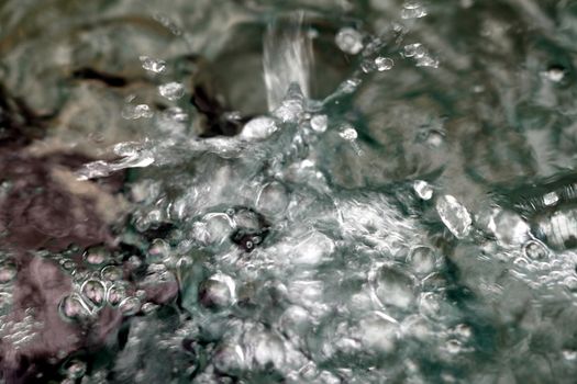 close up macro of water in a fountain
