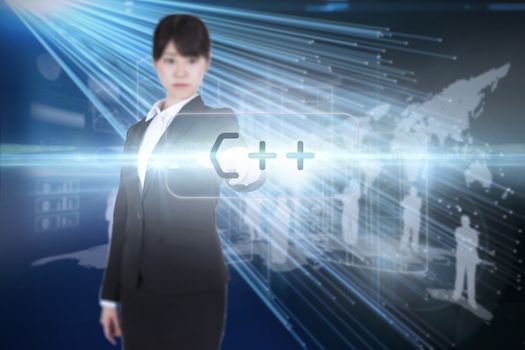 The word c   and focused businesswoman pointing against abstract technology background