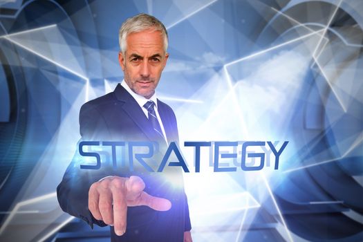 The word strategy and businessman pointing against white abstract angular design
