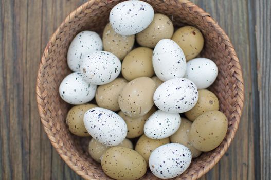 Easter eggs inside a wicker basket 