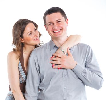 Portrait of happy couple. Attractive man and woman being playful. Isolated on white background.