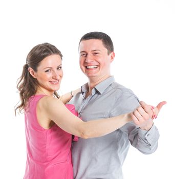 Portrait of happy couple. Attractive man and woman being playful. Isolated on white background.