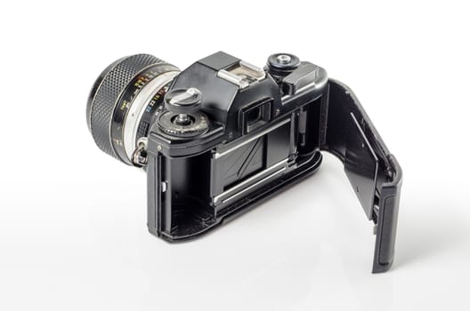  rear-view  of a film photo camera  isolated on white :Clipping path included  