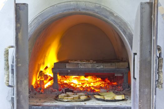 Brick pizza oven with fire