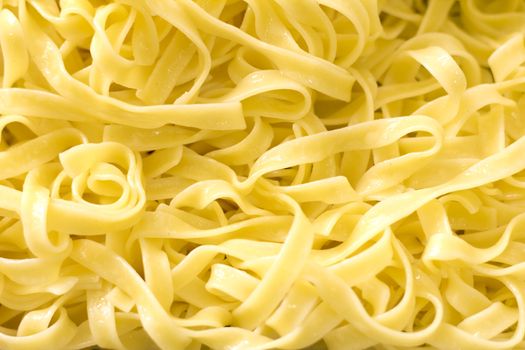 Pasta tagliatelle close up for background 