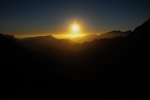 Backlight Silhouette Sunset over the Mountains in Canary Islands Tenerife