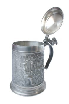 Antique German pewter beer stein with engraving.