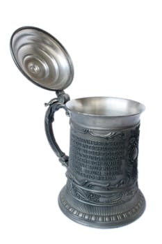 Antique German pewter beer stein with engraving.