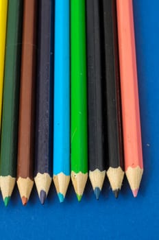 New Pencils Textured Set on a Colored Background