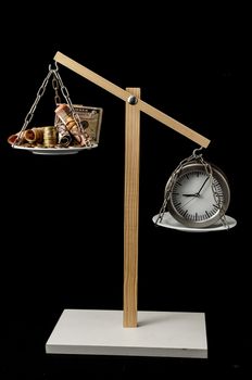 Time is Money Concept Clock and Currency on a Two Pan Balance