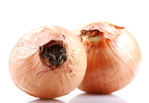 Fresh onion bulbs isolated on white background
