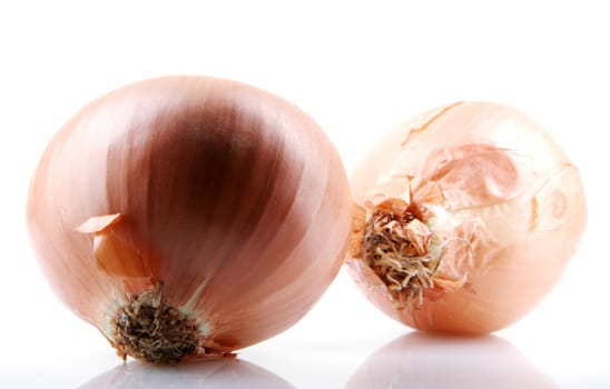 Fresh onion bulbs isolated on white background