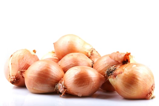 Fresh onion bulbs isolated on white background