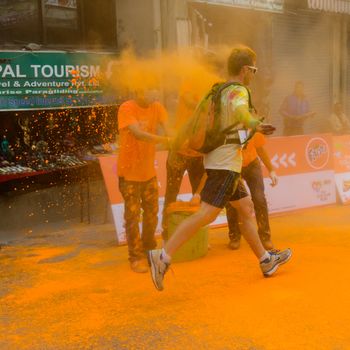 KATHMANDU, NEPAL - MARCH 15, 2014: The Colour Run is part of the Holi Festival celebrations.