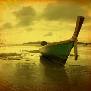 Retro beach with long Tail boat for background 