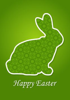 greeting card for Easter with Easter Bunny on green grass