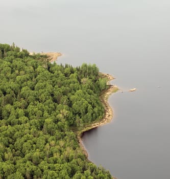 plane view of a wild island on a lake