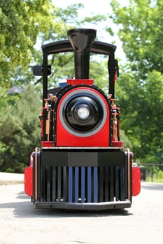 front view of a red and black locomotive