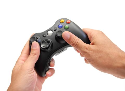 closeup of two hands holding a videogame controller